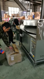 Flatbread oven packing and factory inspection scene